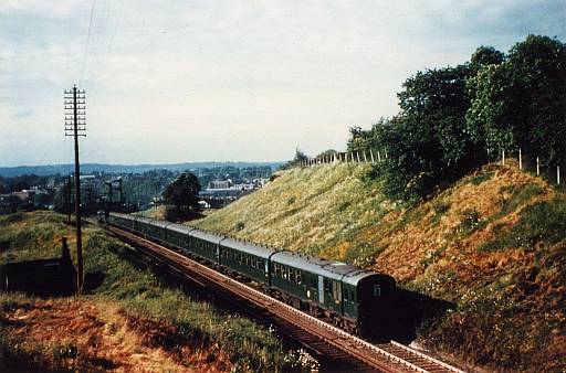[PHOTO: Train in countryside: 36kB]