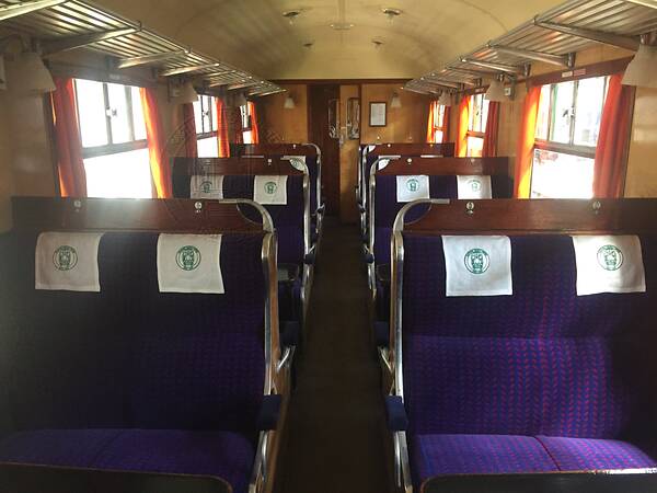 [PHOTO: Interior of train carriage: 35kB]