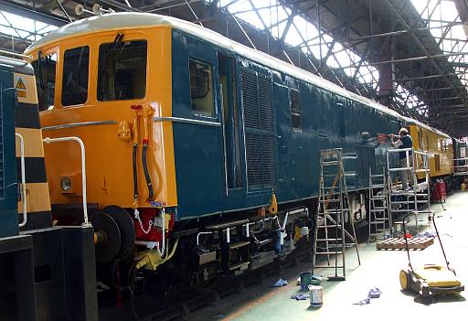 [PHOTO: locomotive in depot after repainting: 39kB]