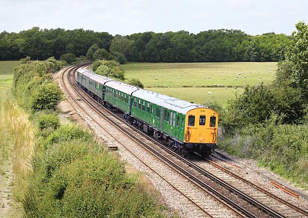 [PHOTO: Train in a countryside setting: 75kB]