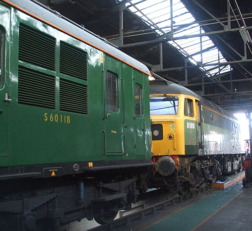[PHOTO: Green DEMU meets green locomotive: 67kB]
