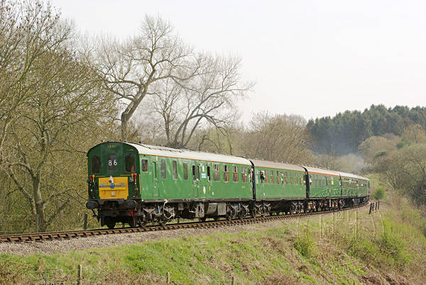 [PHOTO: Train in landscape: 82kB]