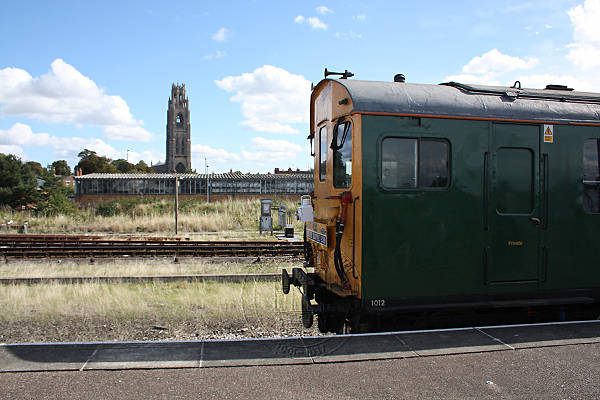 [PHOTO: Train with tower in distance: 49kB]