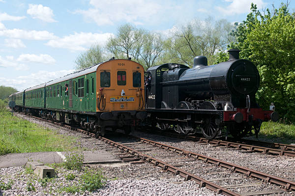 [PHOTO: Steam and diesel trains: 74kB]