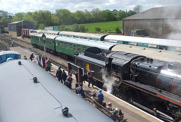 [PHOTO: Trains in bustling station: 53kB]