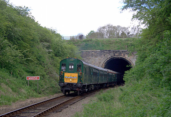 [PHOTO: Train emerges from tunnel: 57kB]