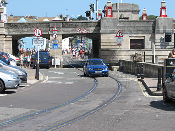 [PHOTO: Seaside street with tram-tracks: 61kB]