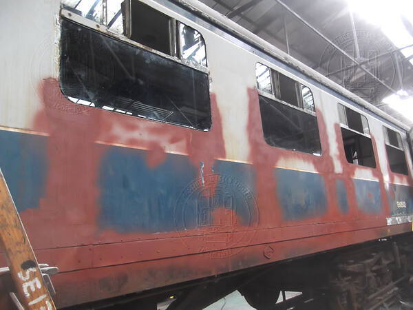[PHOTO: patches of primer on train body: 37kB]